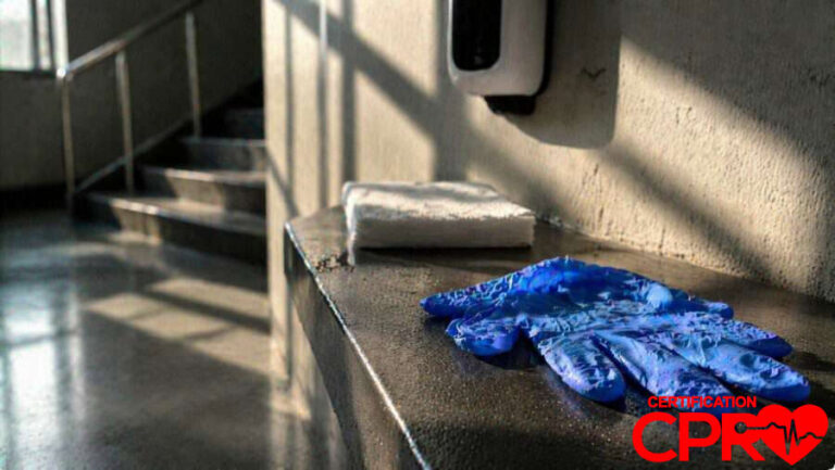 CPR training gloves and mask on a training station in Arlington.